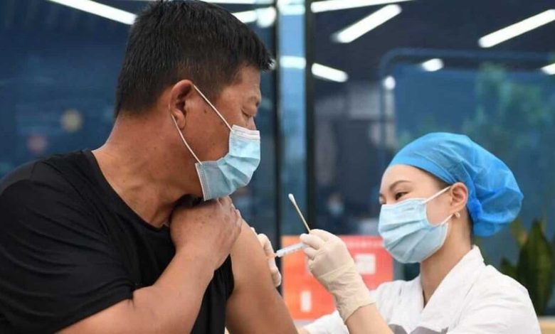 China approves its first mRNA vaccine for Covid-19 |  World news