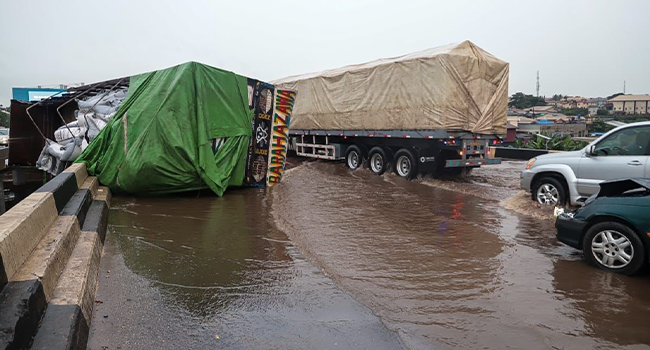 Gridlock, Flood As Truck Plunges From Lagos Bridge In ‘Fatal’ Accident