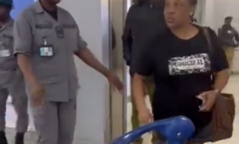 ‘Prison straight’, Netizens react as woman destroys husband’s passport at Lagos airport