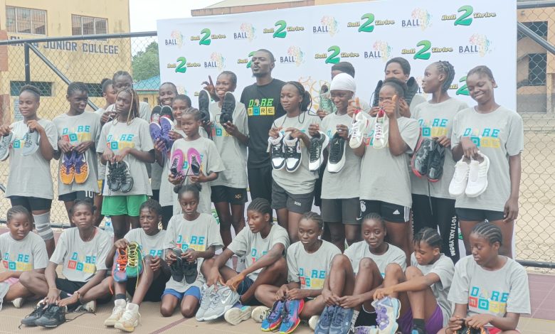 Group donates basketball shoes to female players in Lagos