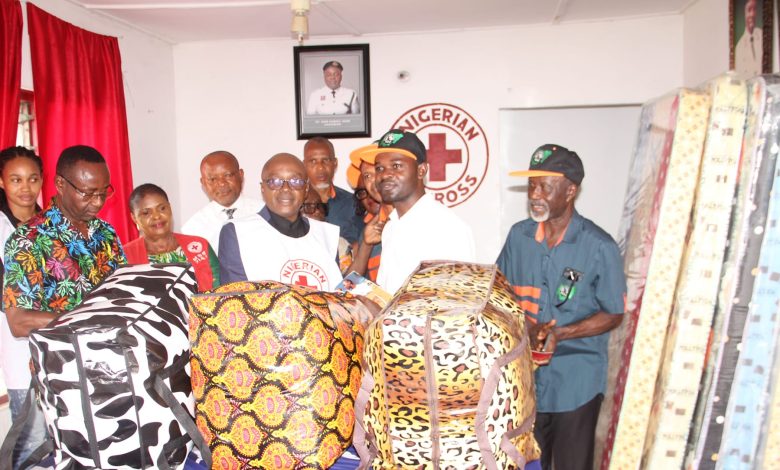 Journalists donate relief materials to Red Cross, task govt on disaster preparedness