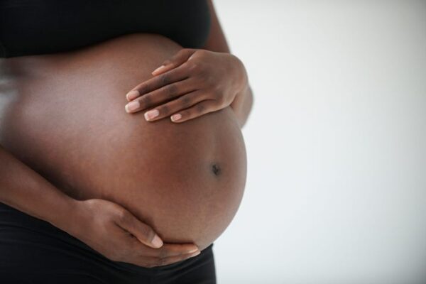 Pregnant woman found hanging from tree Pregnant woman found hanging from tree