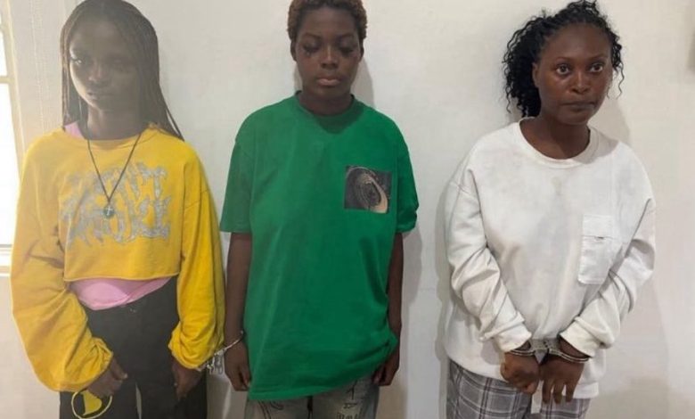 Police parade three ladies for assaulting, stripping their friend Police parade three ladies for assaulting, stripping their friend