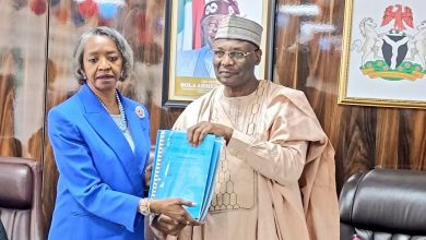 Tinubu confers national honour on Yakubu, accepts his exit as INEC chair