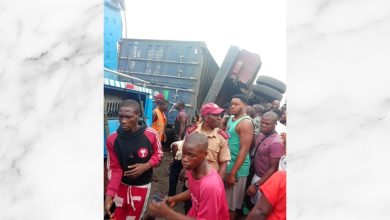 Two killed inside tricycle as container falls off trailer
