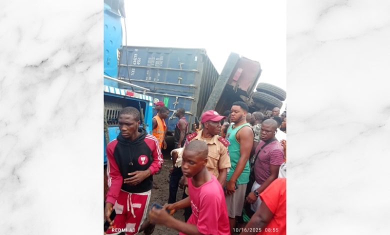 Two killed inside tricycle as container falls off trailer