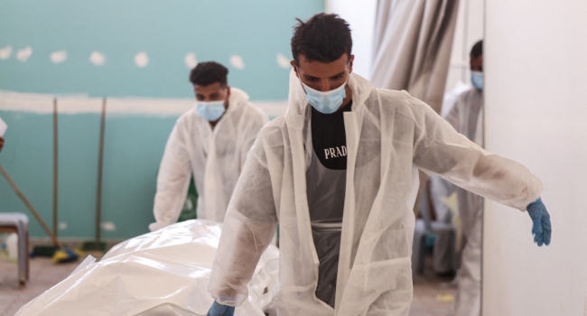 Israel Returns Remains Of 30 More Palestinians To Gaza