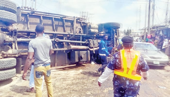 Truck Crushes Lagos Tricyclist To Death, Injures Two Truck Crushes Lagos Tricyclist To Death, Injures Two